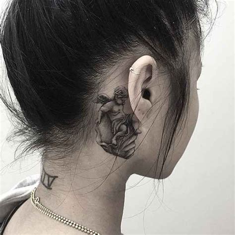 angel whispering in ear neck tattoo|Top 10 angel whispering tattoo ideas and inspiration